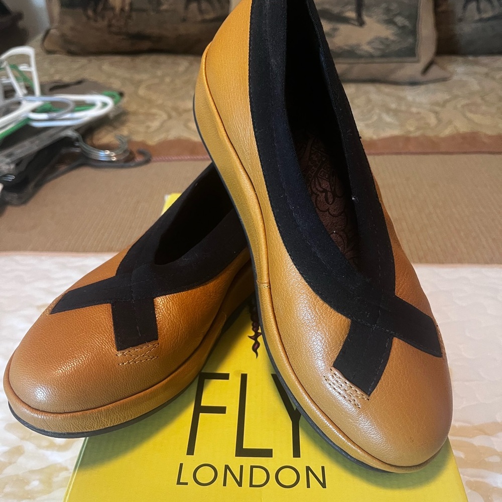 Fly London Brown and Black Wedges